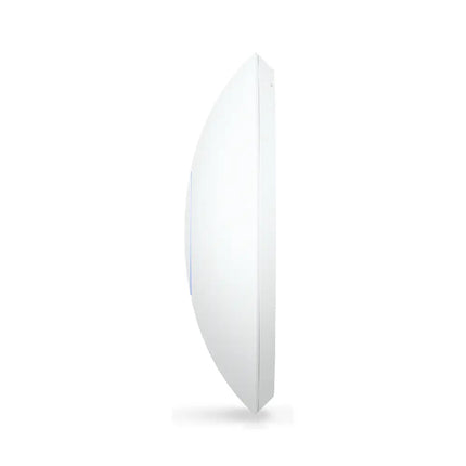 An angled view of the UniFi U7 LR high-performance WiFi 7 access point mounted securely onto a white ceiling.