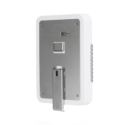 Interior look at the UniFi Access Hub Door showing labeled terminal blocks for 12V and dry lock relays, AUX outputs, request-to-exit buttons, and door position sensors.