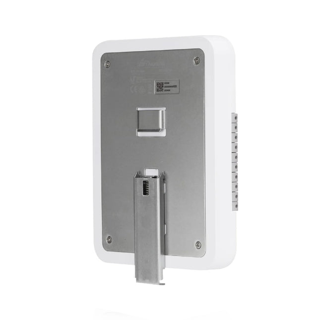 Interior look at the UniFi Access Hub Door showing labeled terminal blocks for 12V and dry lock relays, AUX outputs, request-to-exit buttons, and door position sensors.