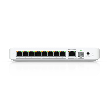 High-angle studio view of the sleek, compact matte white housing of the UniFi USW-Flex-2.5G-8-PoE network switch, featuring a fanless design for silent desktop or wall-mount deployment.