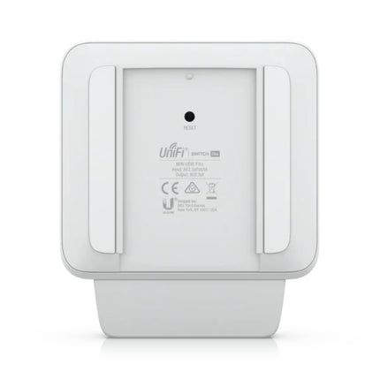 Close-up of the removable protective cable-management cover and the integrated mount on the UniFi USW-Flex switch, arranged for sleek pole, wall, or desk installations.