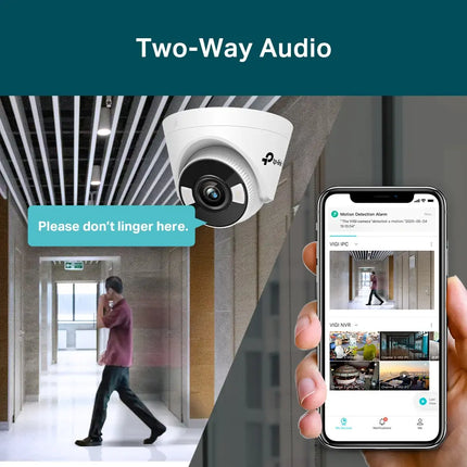 Three-quarter angled view of the TP-Link VIGI C450 5MP security camera, displaying the adjustable turret rotation and PoE connection cable.
