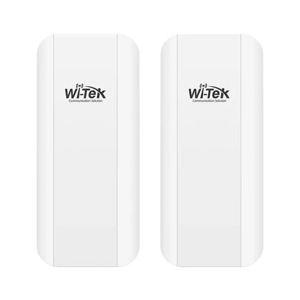 Close-up view inside the slide-down weather protection shield of a Wi-Tek wireless CPE showing its dual 100Mbps Ethernet ports used for PoE power input and camera connections.